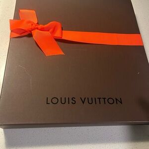 Louis Vuitton tote bag.   Enjoy the holidays with your new Louie.